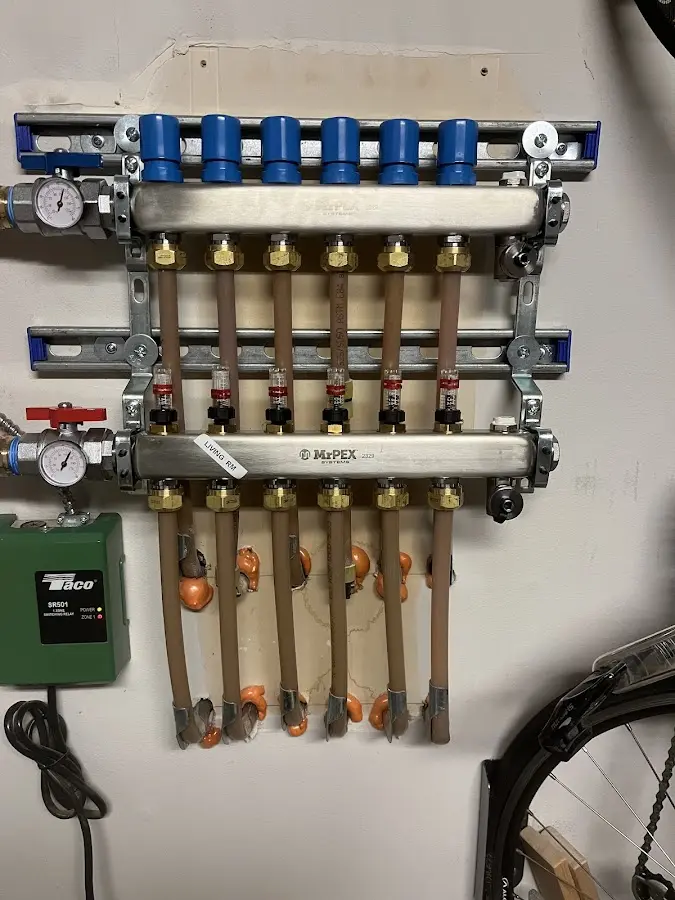 Plumber performing Water Heater Repair at a residential property in Buckhall